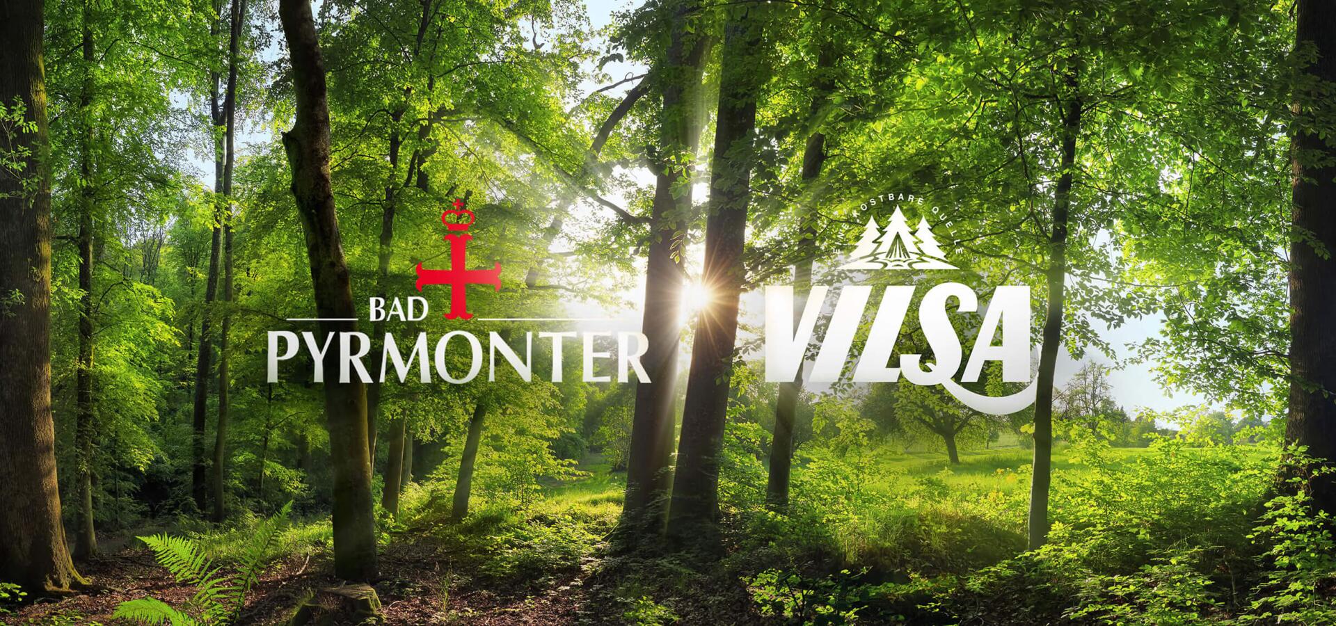 Logos von Bad Pyrmonter und Vilsa vor einem sonnendurchfluteten Wald.