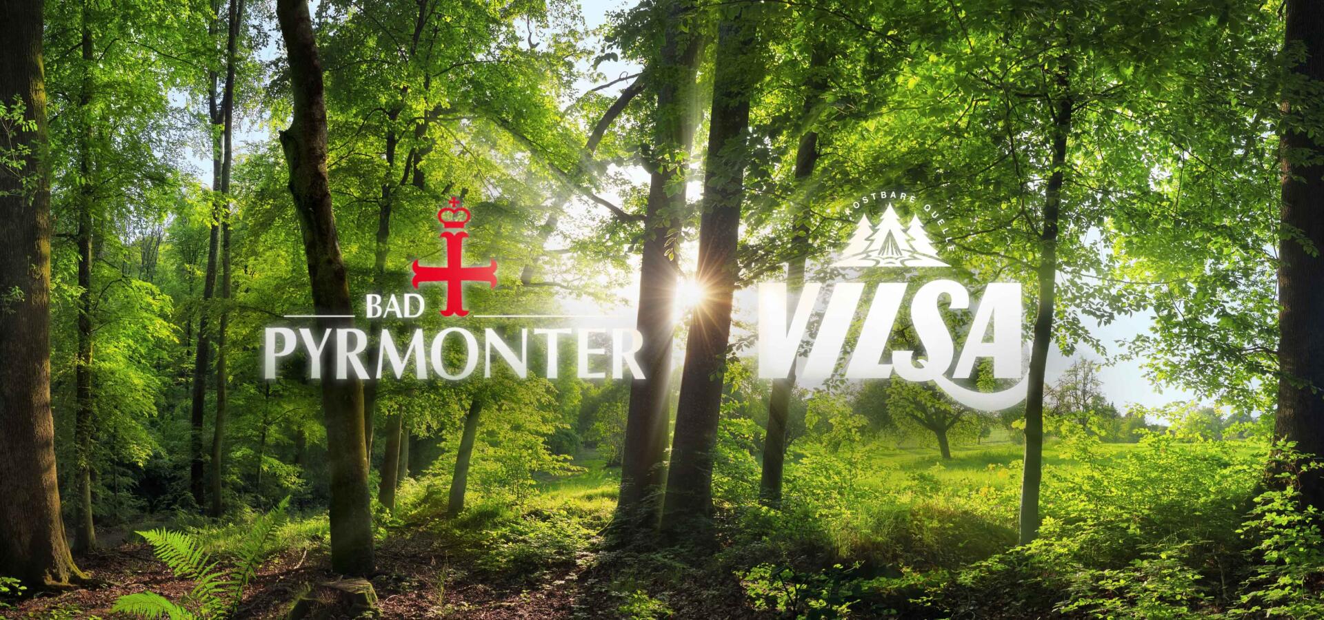 Logos von Bad Pyrmonter und Vilsa vor einem sonnendurchfluteten Wald.